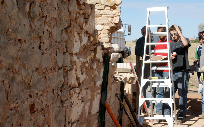 Now we bring out the hydraulic jacks to straighten the Western wall on Moffitts house