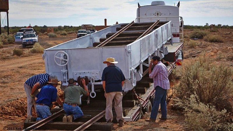 Assembling temporary fishplates ready for unloading the rail truck